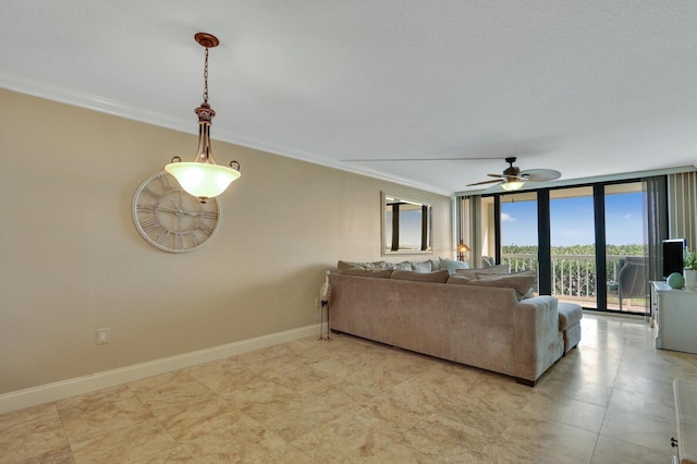 living room with ornamental molding, floor to ceiling windows, and ceiling fan