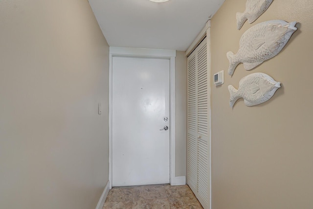 doorway with baseboards