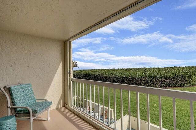10600 S Ocean Dr Unit 109, Jensen Beach, FL 34957 - balcony featuring agricultural plots and a view of rural / pastoral area