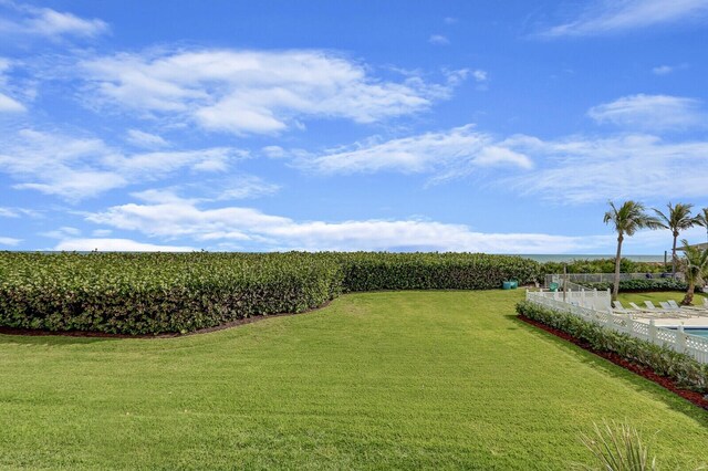 view of yard with a rural view