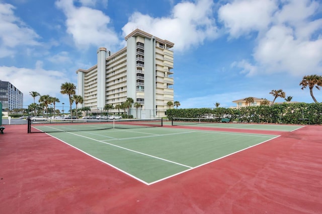 view of sport court featuring community basketball court and fence