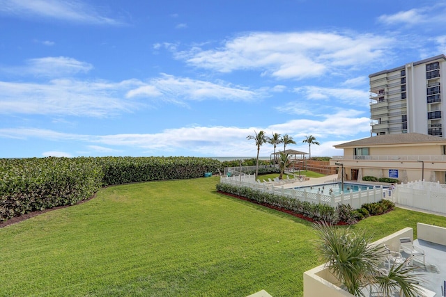 10600 S Ocean Dr Unit 109, Jensen Beach, FL 34957 - view of yard featuring a community pool