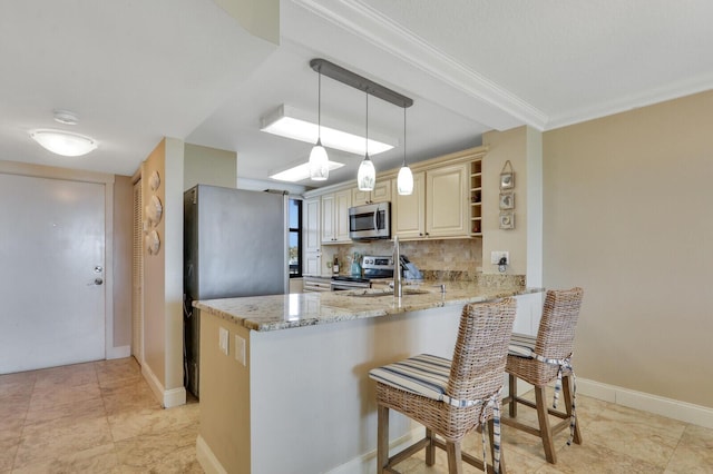 kitchen featuring a kitchen breakfast bar, stainless steel appliances, light stone counters, tasteful backsplash, and kitchen peninsula