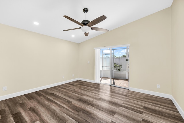 empty room featuring dark wood-type flooring, ceiling fan, and lofted ceiling