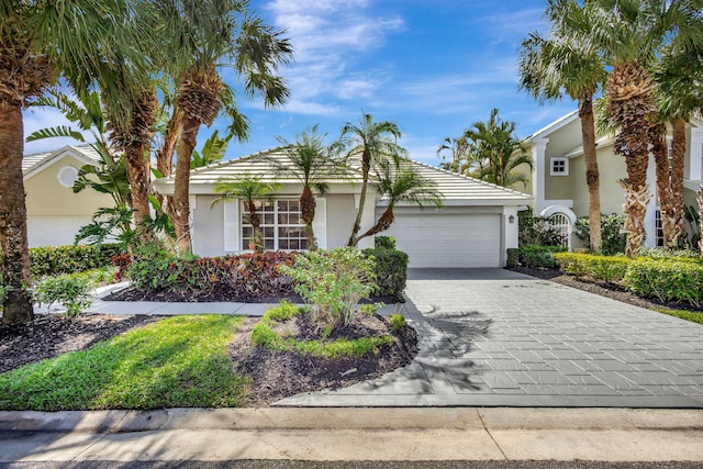 view of front of property with a garage