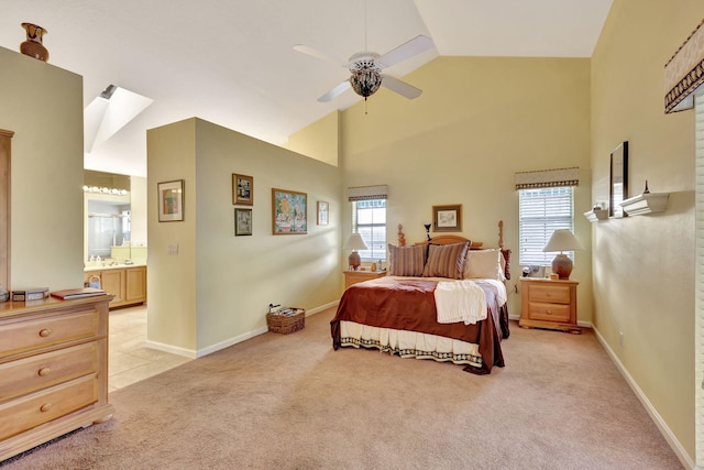 9158 Heathridge Dr, West Palm Beach, FL 33411 - carpeted bedroom featuring ceiling fan, connected bathroom, high vaulted ceiling, and multiple windows