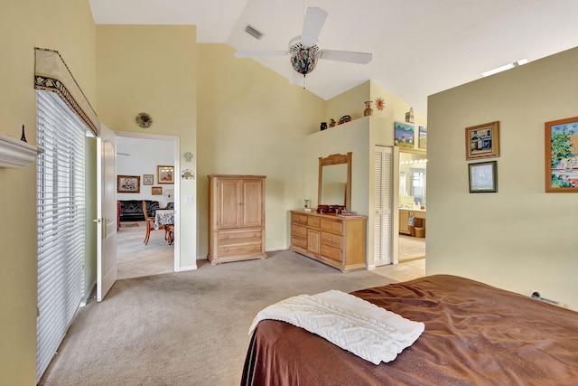 9158 Heathridge Dr, West Palm Beach, FL 33411 - bedroom featuring a closet, ceiling fan, high vaulted ceiling, and light carpet