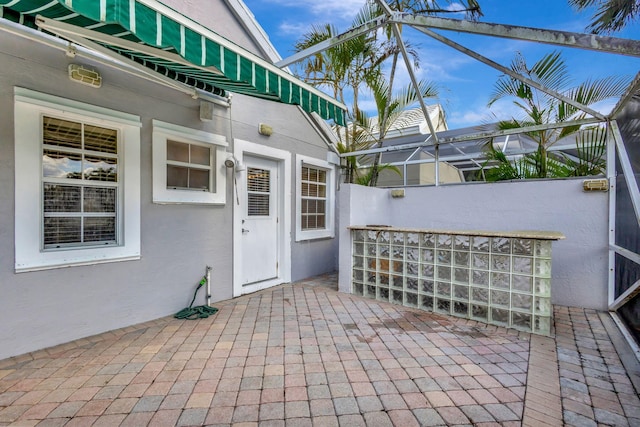 9158 Heathridge Dr, West Palm Beach, FL 33411 - view of patio / terrace featuring glass enclosure