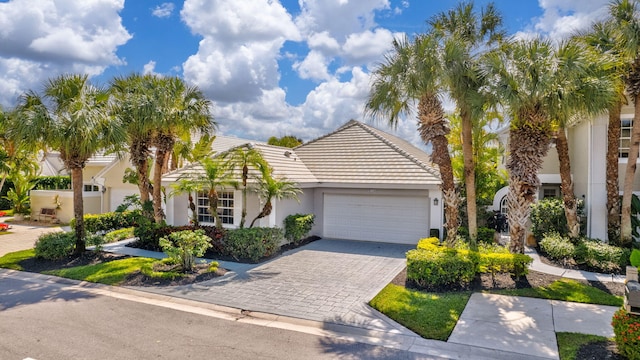 9158 Heathridge Dr, West Palm Beach, FL 33411 - view of front of home featuring a garage