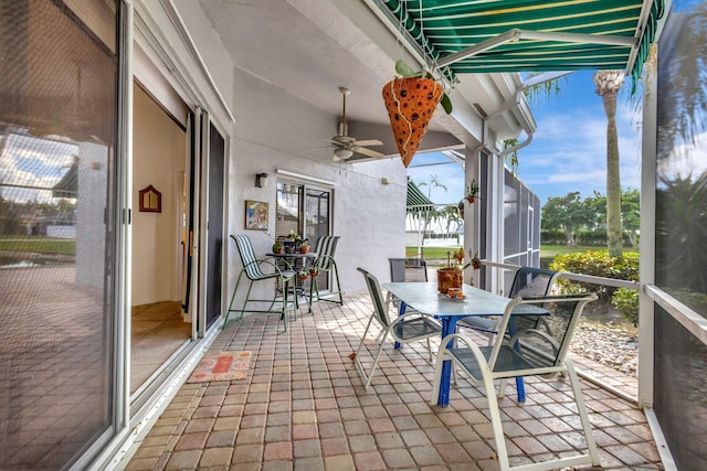 9158 Heathridge Dr, West Palm Beach, FL 33411 - unfurnished sunroom with ceiling fan