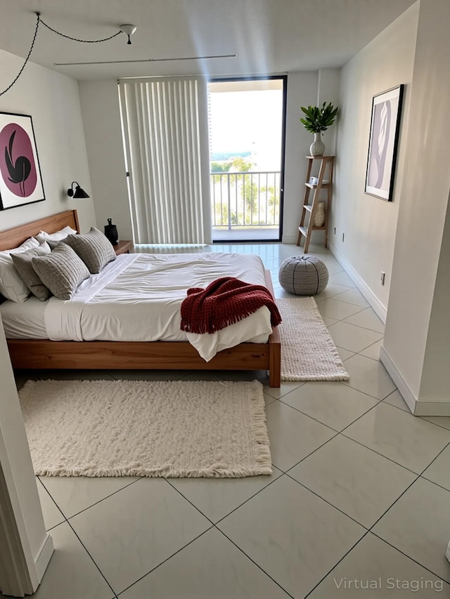 290 174th St Unit 1111, Sunny Isles Beach, FL 33160 - bedroom featuring baseboards and light tile patterned floors