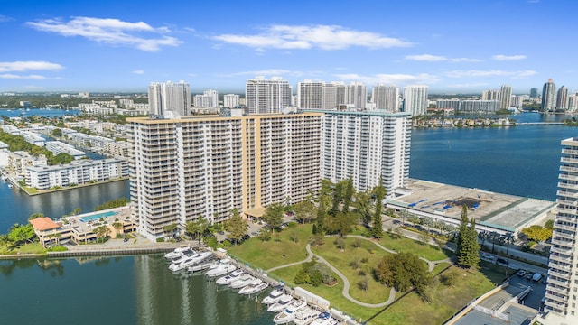 aerial view featuring a water view and a view of city