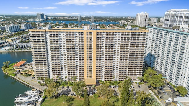 bird's eye view featuring a water view and a view of city