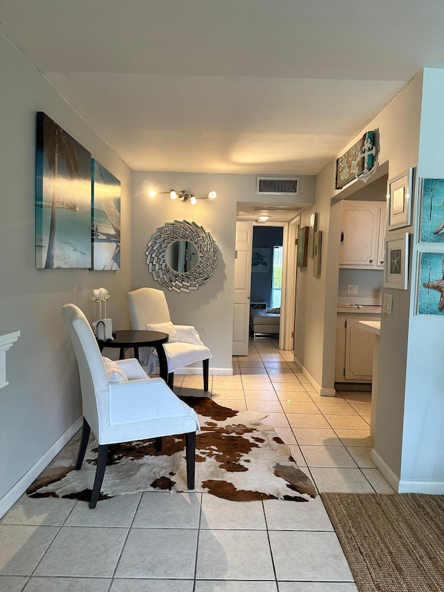 interior space featuring light tile patterned flooring