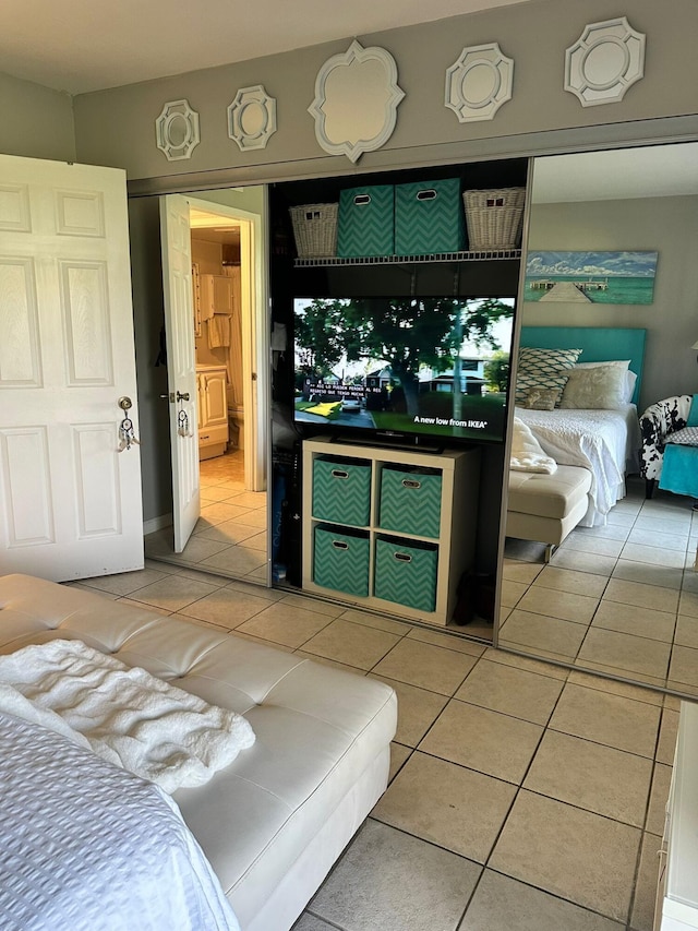 bedroom with tile patterned floors