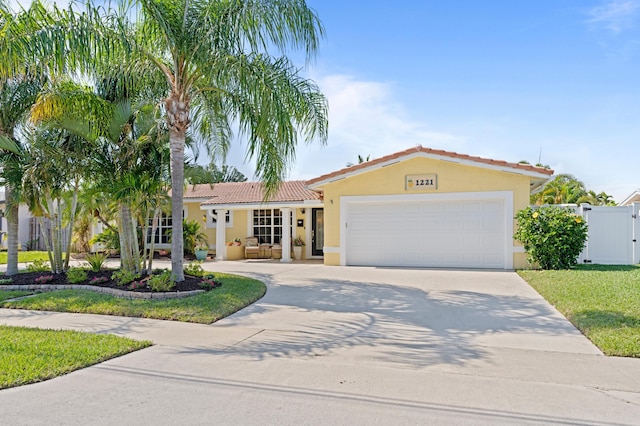 view of front of property with a garage