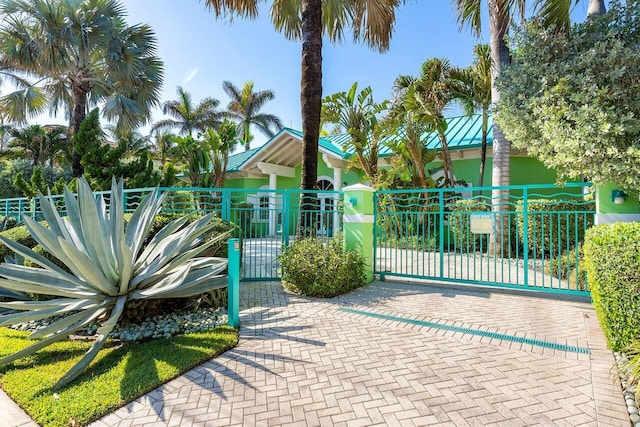 view of gate with fence