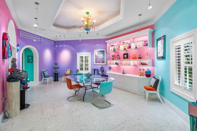 playroom featuring crown molding, a tray ceiling, a chandelier, and baseboards