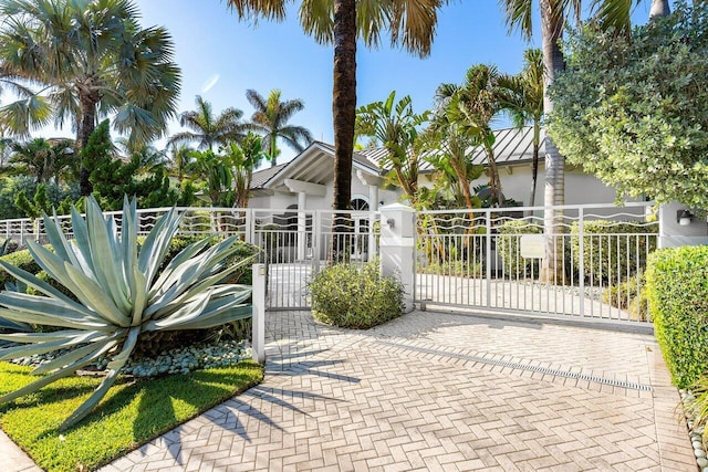 view of gate with fence