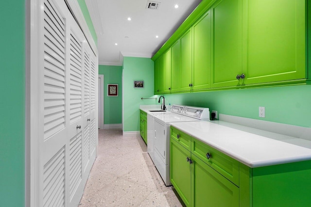 laundry area with washer and clothes dryer, cabinet space, visible vents, ornamental molding, and baseboards