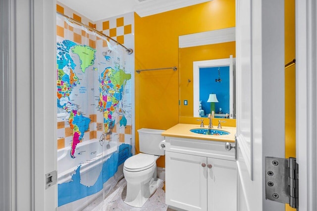 bathroom with shower / tub combo, crown molding, vanity, and toilet