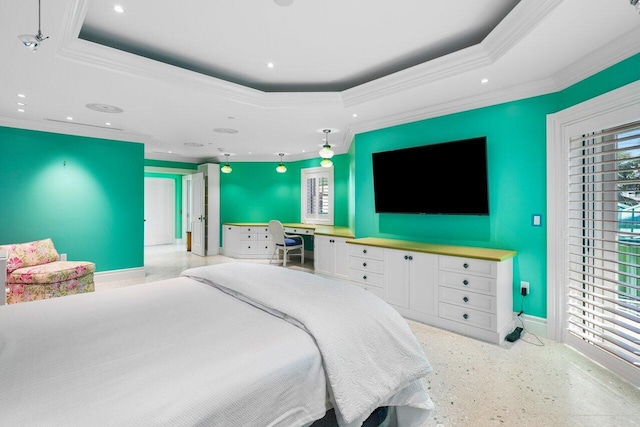 bedroom featuring baseboards, a tray ceiling, built in desk, and recessed lighting