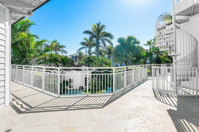 balcony featuring stairs