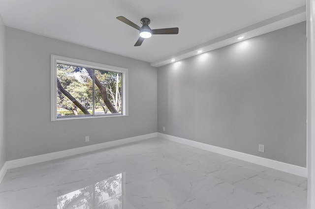 empty room featuring ceiling fan