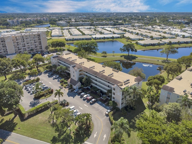 drone / aerial view with a water view