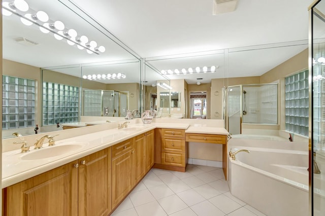 bathroom with vanity, separate shower and tub, and tile patterned floors