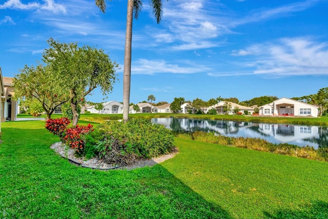 view of yard with a water view