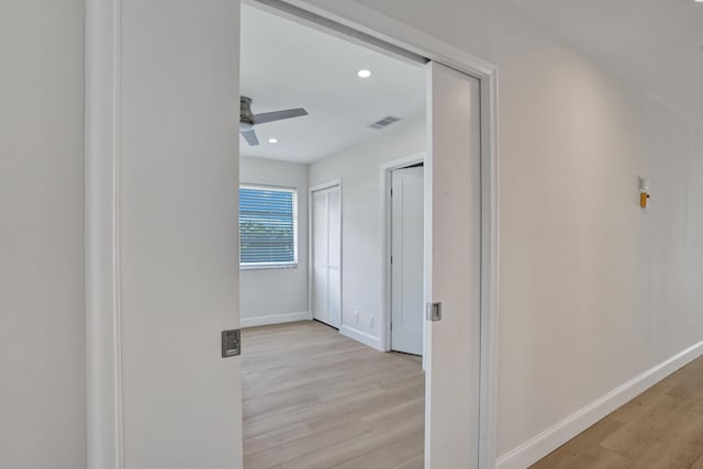 hall featuring light wood-type flooring