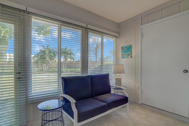 sitting room with light tile patterned floors