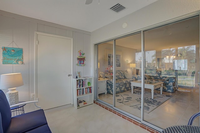 interior space featuring ceiling fan