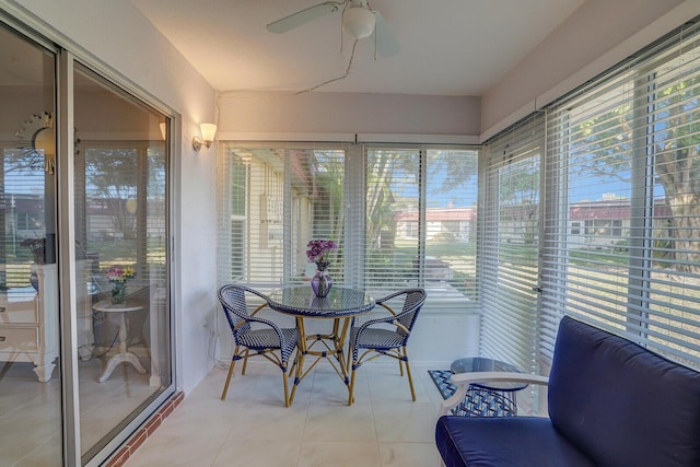 sunroom / solarium with ceiling fan