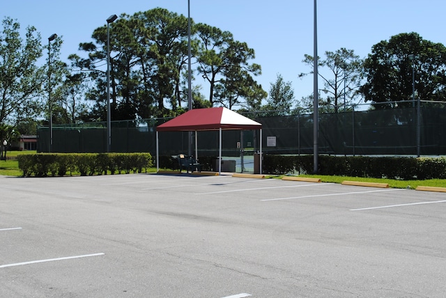 view of parking / parking lot featuring a gazebo