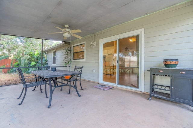 sunroom / solarium with ceiling fan