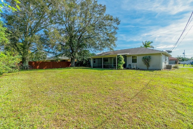 view of yard featuring central AC