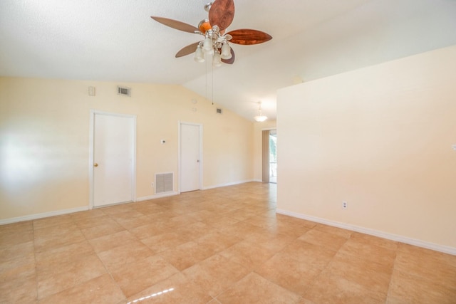 empty room with lofted ceiling and ceiling fan