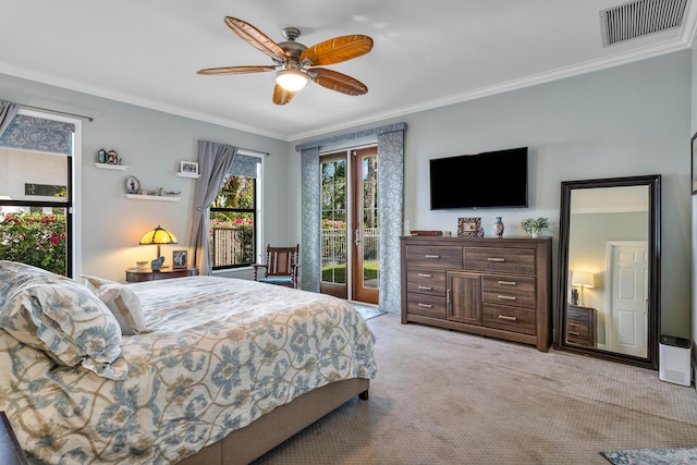 bedroom with crown molding, ceiling fan, access to outside, light colored carpet, and french doors