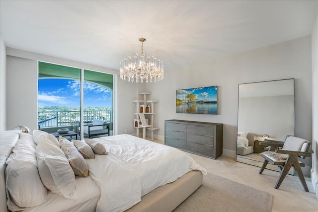 carpeted bedroom featuring floor to ceiling windows, access to outside, and an inviting chandelier