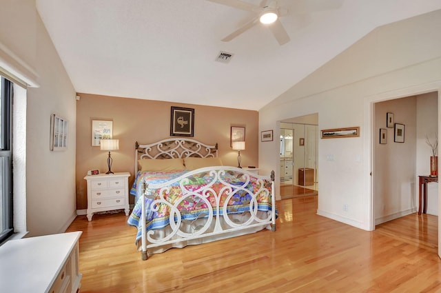 bedroom featuring ceiling fan, lofted ceiling, and wood-type flooring