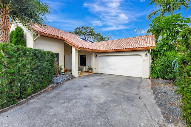 view of front of property featuring a garage