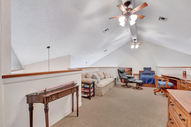 carpeted living room featuring lofted ceiling