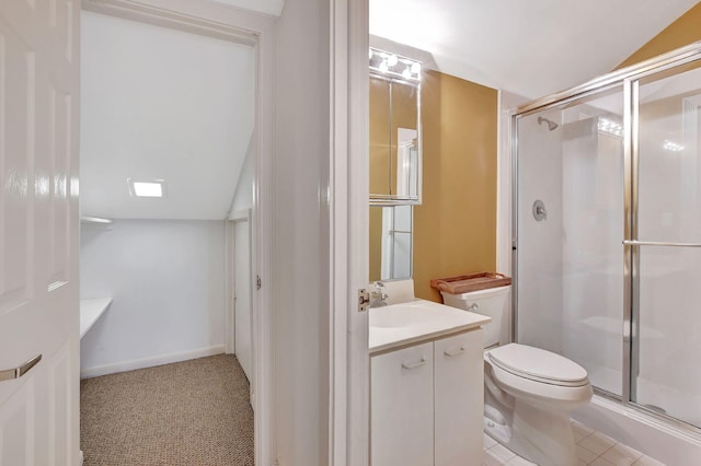 bathroom with vanity, lofted ceiling, toilet, and walk in shower