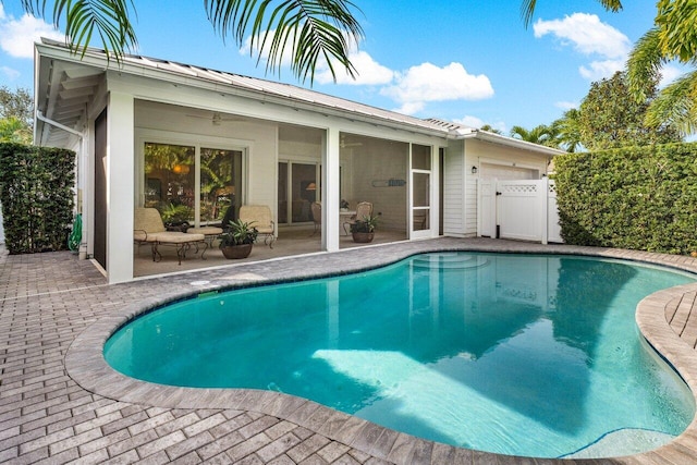 view of pool featuring a patio area