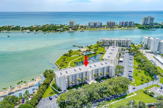 birds eye view of property featuring a water view