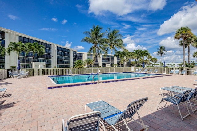 view of swimming pool featuring a patio