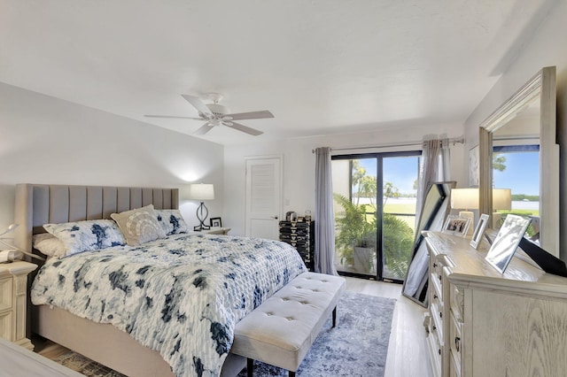 bedroom with ceiling fan, access to outside, and light wood-type flooring