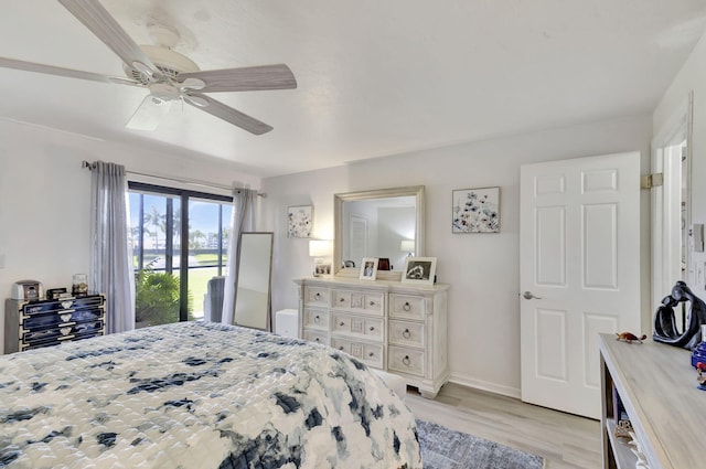 bedroom with access to exterior, ceiling fan, and light hardwood / wood-style flooring